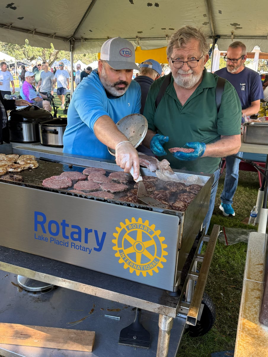 Cooking Burgers at the Caladium Festival